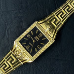 YELLOW GOLD VERSACE BLACK FACE WATCH