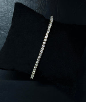 WHITE GOLD PRONG SET TENNIS BRACELET