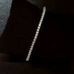 WHITE GOLD PRONG SET TENNIS BRACELET